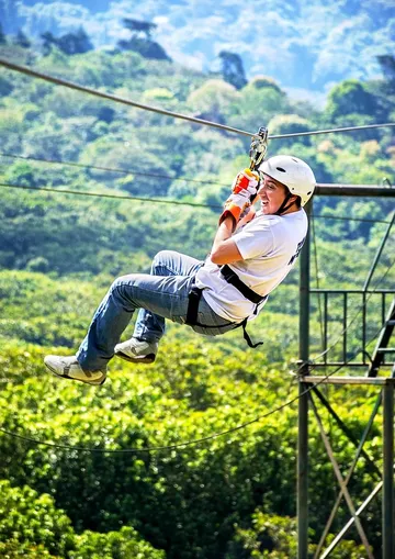 Kyle unhooking ziplining 8-2-17 Aunt Heather Piper