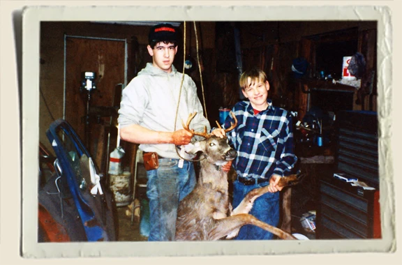 Jeremy (cousin) & Ryan, skinning a deer -Heather Piper 