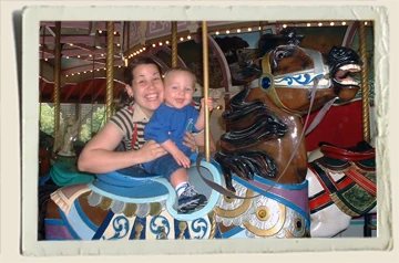 Aunt Heather Piper and Kyle on Merry go Around at Idlewild 
