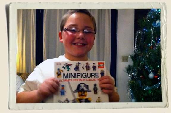 Kyle with his Lego Book from Aunt Heather Piper 