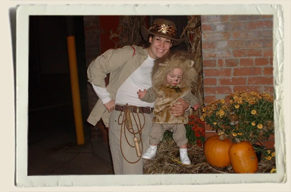 Kyle and Heather Piper as a lion and lion tamer