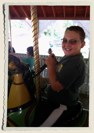 Klye-on-Merry-Go-Round-Idlewild-Aunt-Heather-Piper