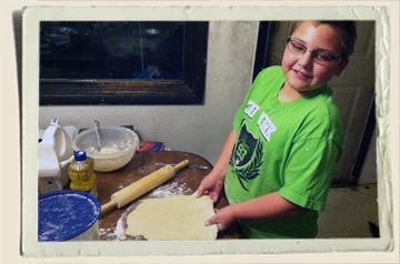 Kyle-rolling-pie-dough-Aunt-Heather-Piper-11-21-12 Kyle-rolling-pie-dough-Aunt-Heather-Piper-11-21-12