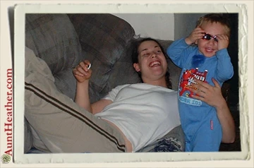 Kyle-in-Aunt-Heather-Piper-sunglasses-laughing 11-18-03