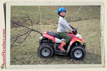 Kyle-on-quad-cleaning-branches-Aunt-Heather-Piper