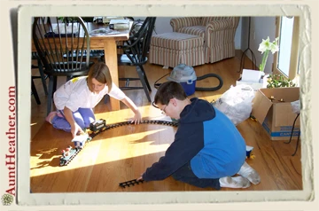 Chad-Sasha-playing-with-train-Aunt-Heather-Piper