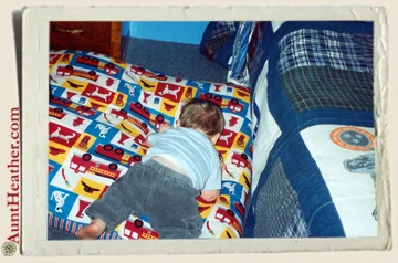 Kyle-sleeping-on-the-pillow-Aunt-Heather-Piper-made-2002
