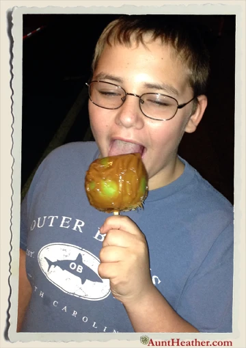 Kyle-eating-his-caramel-apple-at-Fort-Ligonier-Days-Aunt-Heather-Piper-10-12-13