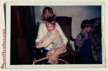 Nicole-holding-Ryan-on-Bike-Aunt-Heather-Piper-1980s