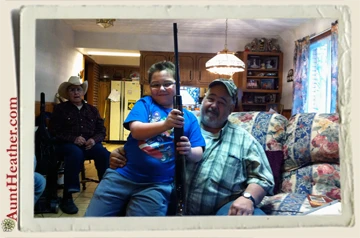 Kyle-with-is-pap-and-rifle-Aunt-Heather-Piper-7-2011