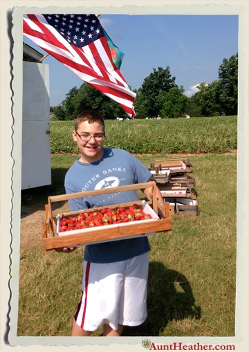 Kyle-holding-fresh-strawberries-Pollock's-Aunt-Heather-Piper-6-28-14