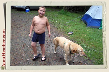 Kyle & Scooby, camping.  Yes, that's Kyle in his underwear & his Aunt Nikki's flip flops.  What a look! 8/21/10